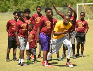 White, several FSU teammates help 'give back' at youth football camp
