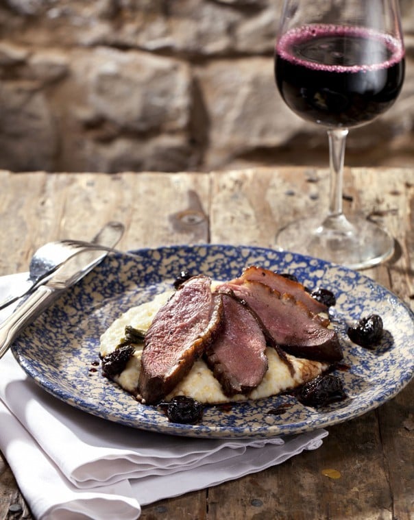 Panroasted Duck Breast with Braised Mustard Greens, Grits and Smoked