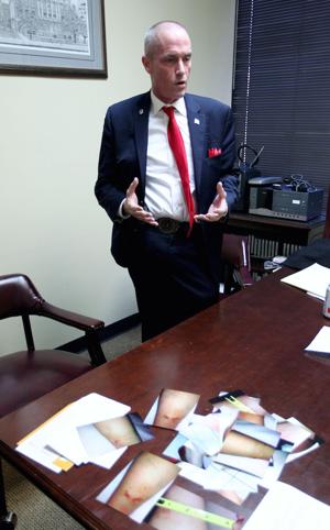 Woman sues owners of dog killed by her pit bulls