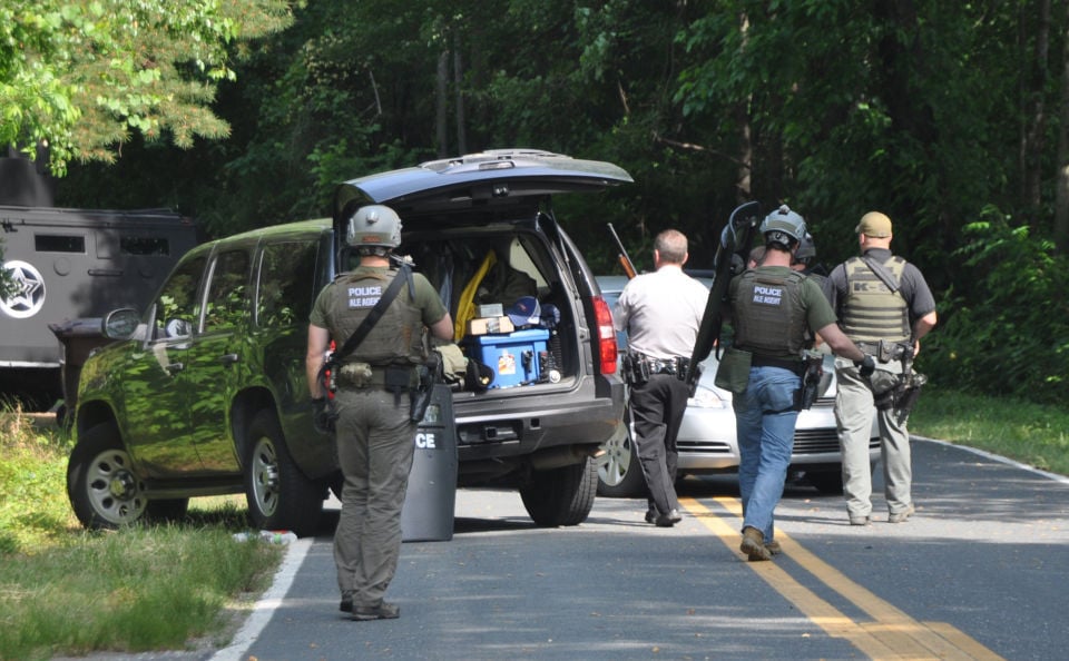 Icard standoff ends in arrest Cops & Courts