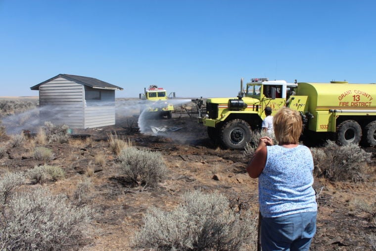 Small brush fire extinguished with help from neighbors ...