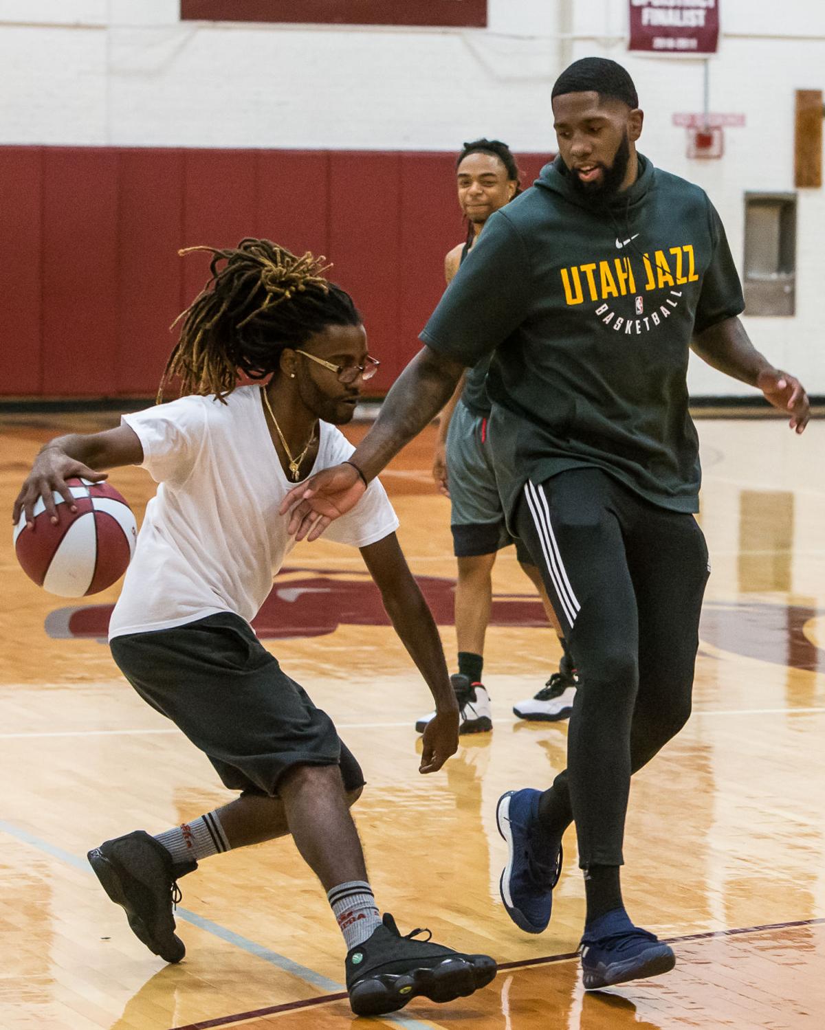 neale, who plays for the nbas utah jazz, defends against dwane