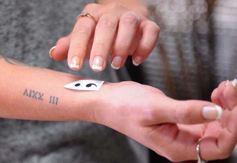 semicolon finger tattoo