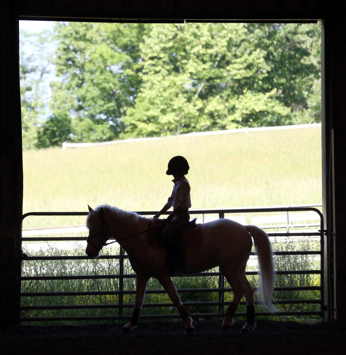 Blacksburg girl gets back in the saddle of horse struck by lightning
