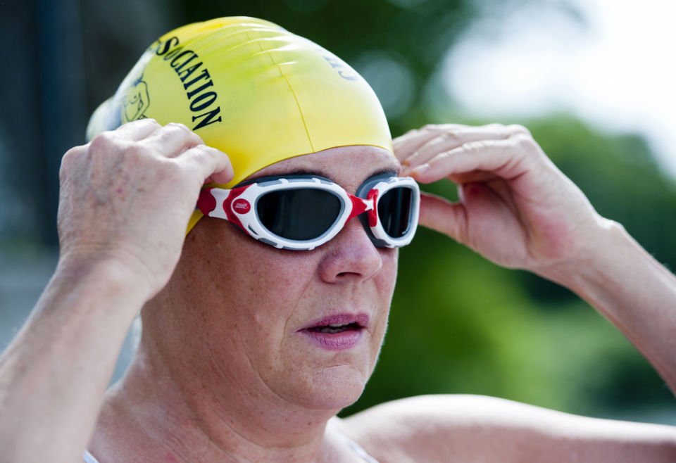 Sarah Dunstan prepares to swim laps at Ivy Lake on Thursday. Dunstan will attempt to swim the English channel at the age of 59. - 5196ddbaa9e48.image