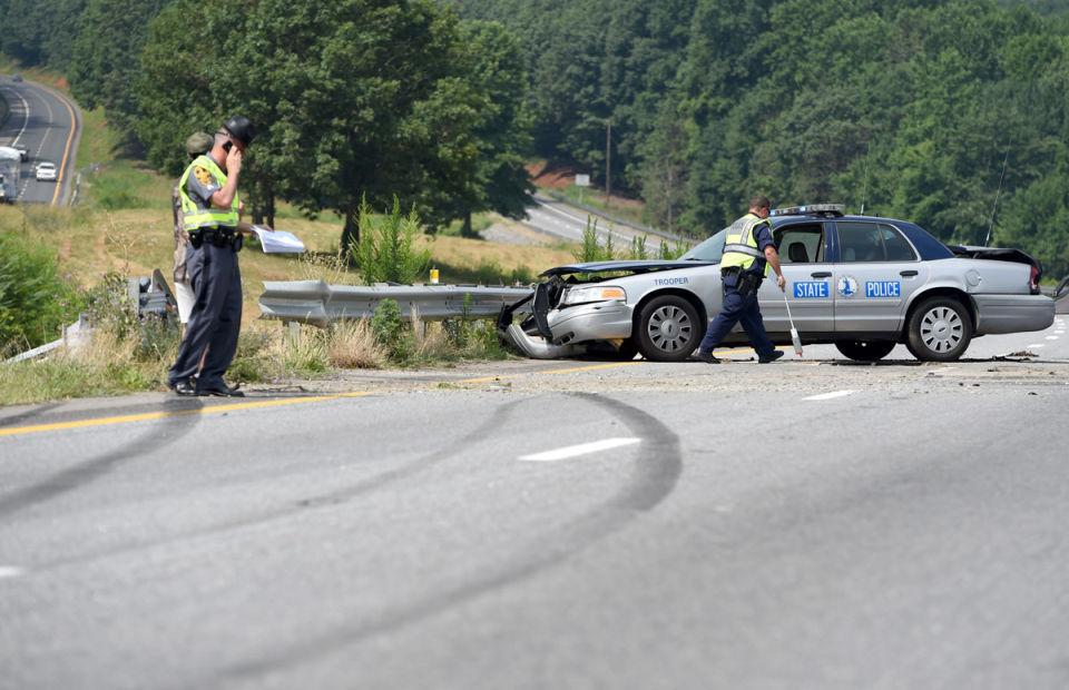 State trooper treated for injuries after US 460 crash