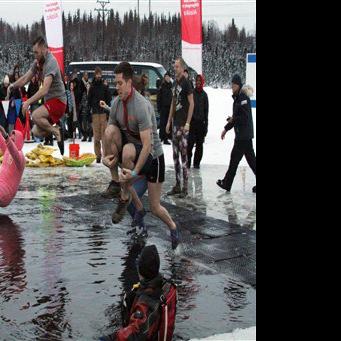 Baptism by ice: Alaskans make annual plunge into frigid lake - Fairbanks Daily News-Miner