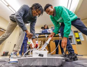 These New Orleans kids built a model of the city's pumps. Then they watched it fail.