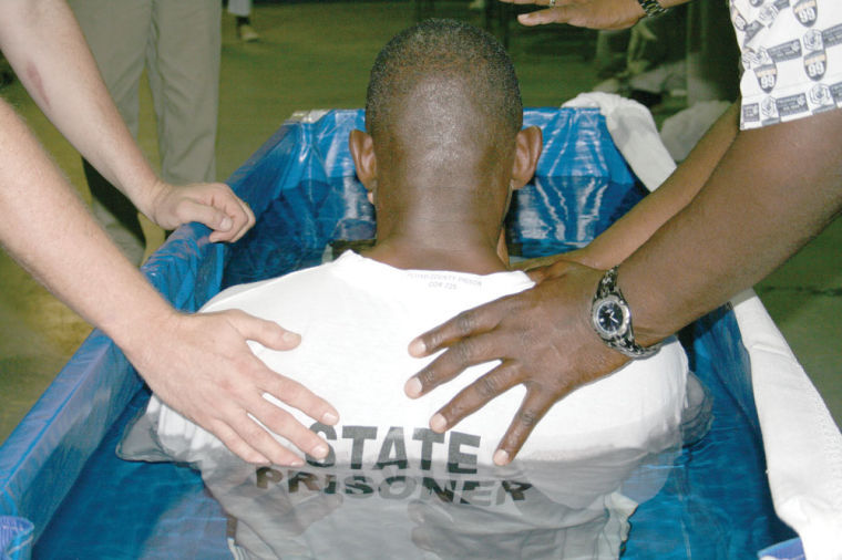 Floyd County Prison inmates get baptized Local News