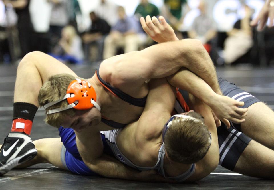 Cowboys dominate first session of Big 12 Wrestling ...