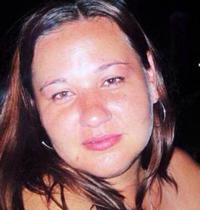 Friends of slain woman hold prayer vigil outside apartment where she died