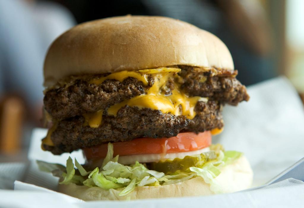 On the hunt for Nebraska #39 s biggest burger Omaha com: GO Arts