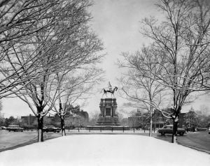 GENERAL LEE WEARS WHITE MANTLE When two inches of snow fell on Richmond last Wednesday, the statue of Robert E. Lee was framed by the snow-laden branches of trees along Monument ave.  The snow was wet and melted quickly.  This photograph actually is a bas