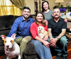 Cancer survivor, family help others cope with disease