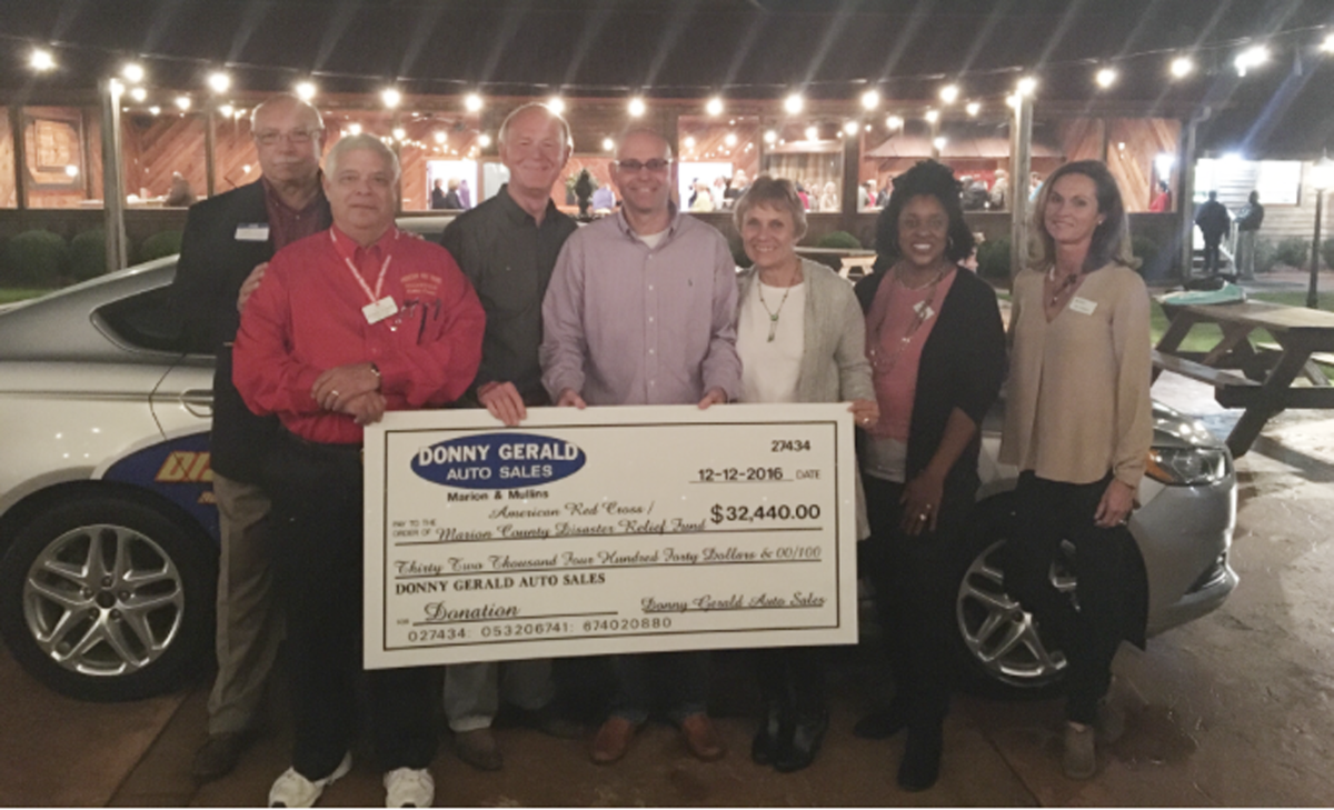Car dealer helps raise money for Marion County disaster