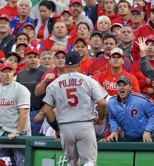 Fans yell at Albert Pujols during Game One NLDS