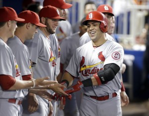 Cards offense erupts in Miami