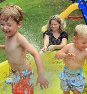 Kathy Cook plays with her kids