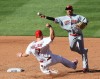 Matt Holliday (left) tries to break up a double-play