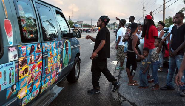 From Ferguson story: Selfies, a porn star, media hordes, running from tear gas