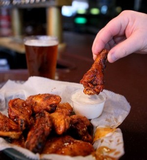 Peppery wings in hot sauce from Lemmons in St. Louis