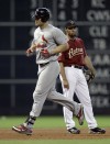 Holliday homers in the 4th