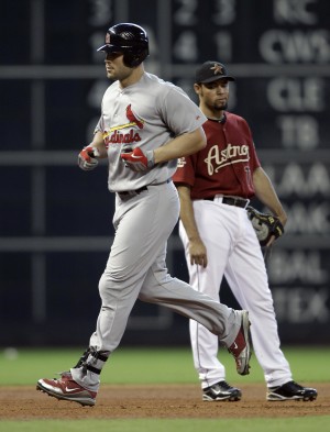 Holliday homers in the 4th
