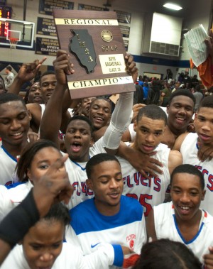 Despite free throw woes, East St. Louis hangs on for wild win ov