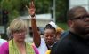 Scores protest police shooting of Michael Brown