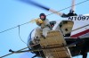 Workers use Helicopter to install 