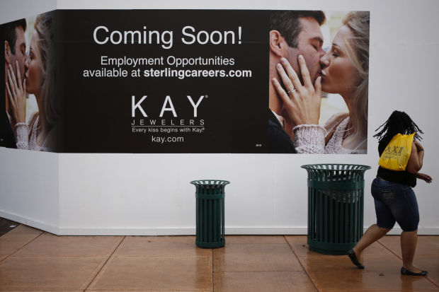 walks past the future location of a KAY Jewelers Inc. store at Easton ...