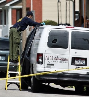 Heavily armed robbers heist armored car