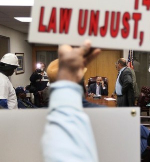 Demonstrators march on ESL Mayor Alvin Parks' office
