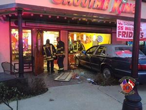 Three injured when car crashes into Smoothie King in Manchester
