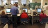 Job applicants fill out forms at Missouri Career Center
