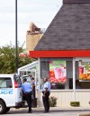 Policeman convinces ax-wielding robber to give up