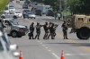 Law Enforcement Surround House on Page Blvd.