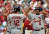 Lance Berkman gets congrats after homer Game One NLDS