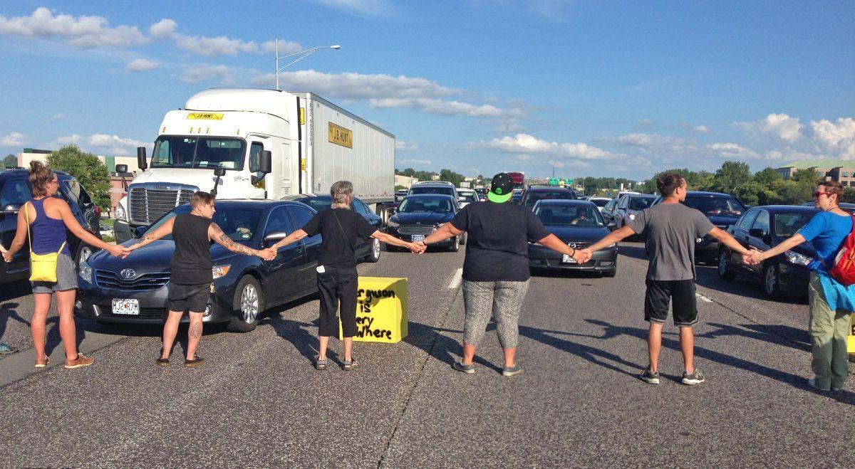 Ferguson protesters block rush-hour traffic on I-70 and get arrested