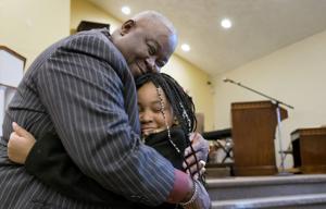 Six months after arson, St. Louis congregation moves back into sanctuary