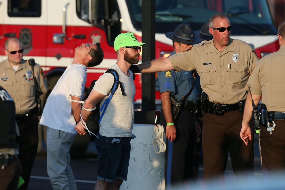 Ferguson protesters block rush-hour traffic on I-70 and get arrested