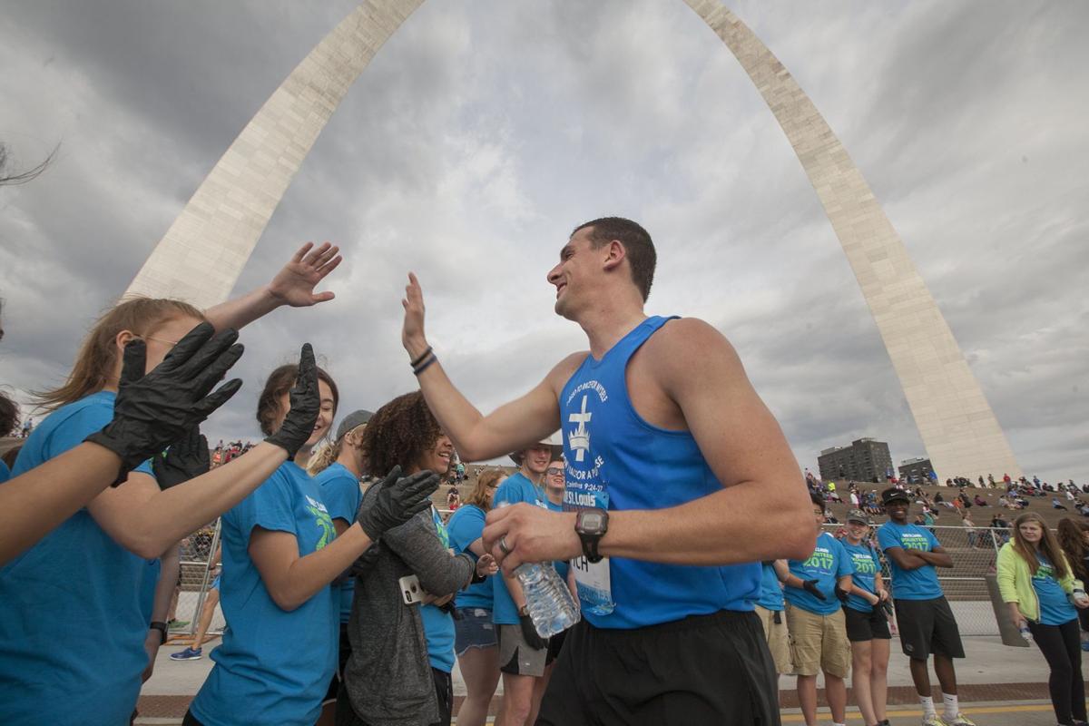 The Go St. Louis Marathon runners race through city streets | Health | www.neverfullmm.com