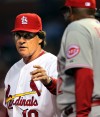 Cardinals play Reds in a downpour at Busch
