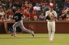 Brewers beat Cards in extras 6-4