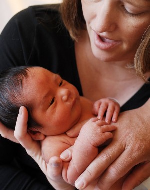 Holding newborns too much doesn't spoil them