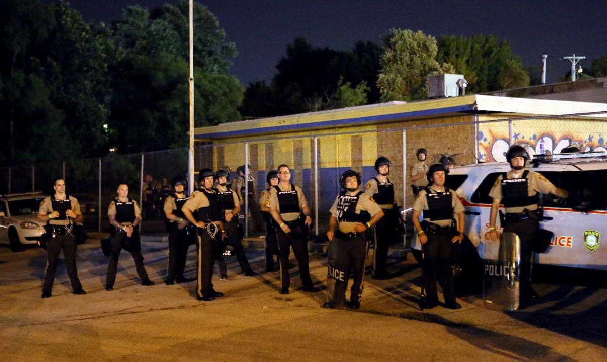 Ferguson protesters block rush-hour traffic on I-70 and get arrested