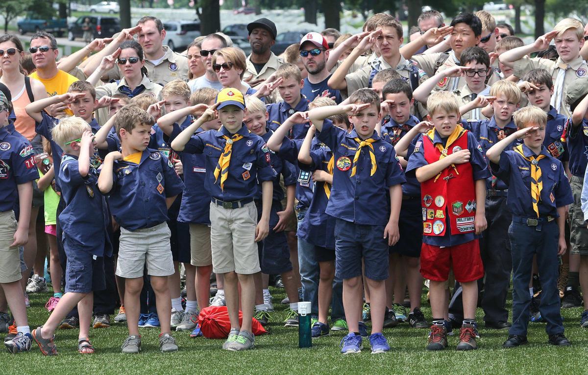 With tens of thousands of flags, Boy Scouts honor those buried at