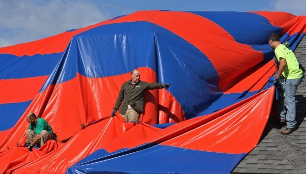 St. Charles house is covered to eliminate spiders