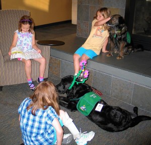 Reading to a dog at the Glen Carbon library  