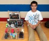 Students "trash-form" garbage into art  